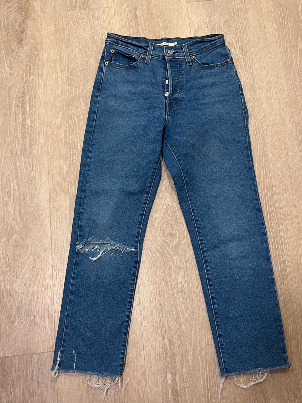 Levi's Women's Straight Leg Jeans in Dark Blue with Distressed Knee